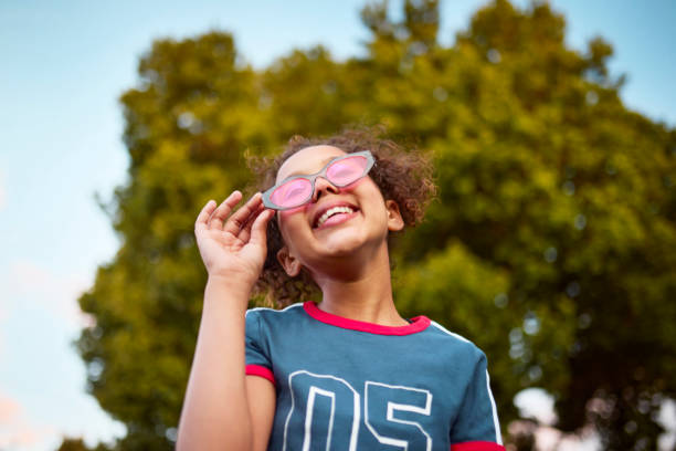 istock Smiling Girl with Pink Sunglasses 2192218066
