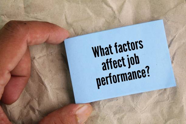 istock colored paper with the question What factors affect job performance? 2192220059
