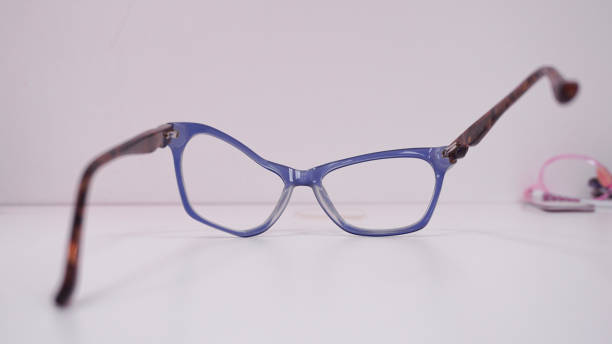 istock Assortment of broken optical eyeglasses, broken hinges, missing lenses 2192220343