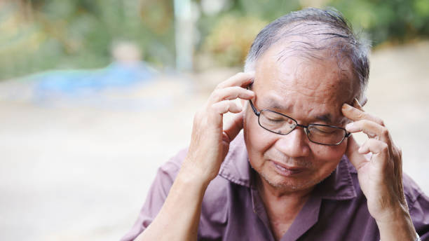 istock A thoughtful elderly man touches his temples, reflecting on deep thoughts or feelings. 2192220833