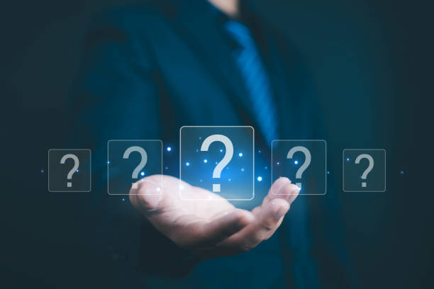 istock Question mark shows on a palm, Businessman show question mark wondering icon, Technology question concept, FAQ, Wondering questioning and problem-solving, Q and A, ask 2192224581