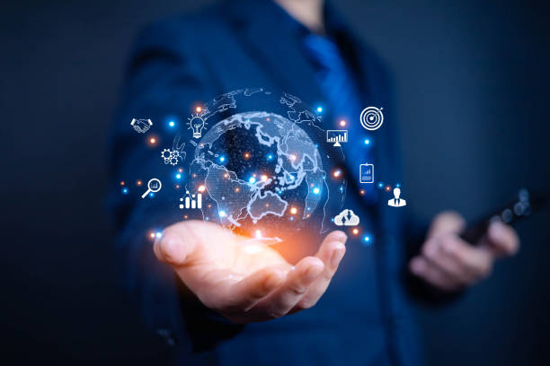 istock Goal, success, Businessman using smart phone shows icon on hand, Access to application technologies from virtual Global Internet connection, Marketing strategy digital, Business Goals 2192224600
