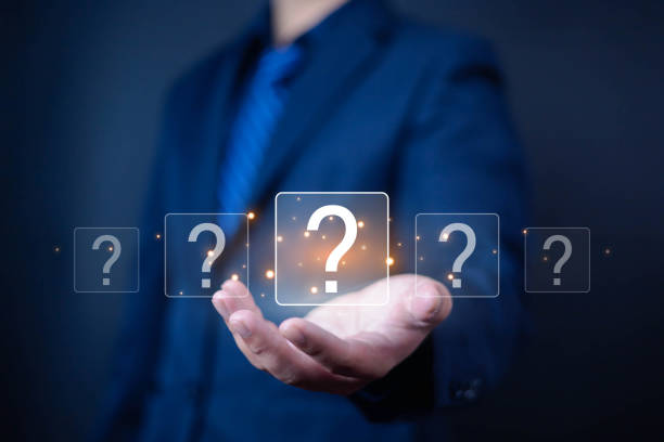 istock Question mark shows on a palm, Businessman show question mark wondering icon, Technology question concept, FAQ, Wondering questioning and problem-solving, Q and A, ask 2192224601