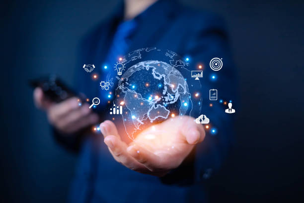 istock Goal, success, Businessman using smart phone shows icon on hand, Access to application technologies from virtual Global Internet connection, Marketing strategy digital, Business Goals 2192224624