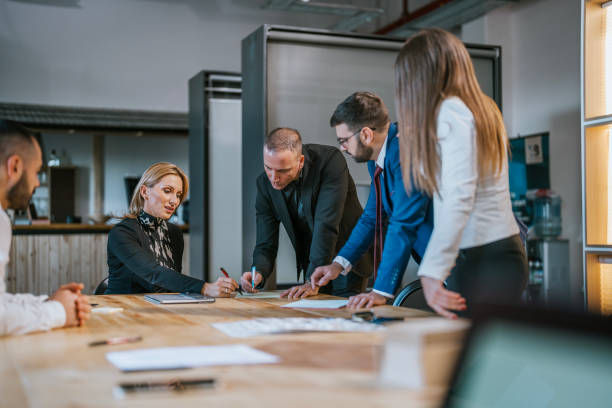 istock Team collaborating during a strategy meeting in a modern office environment 2192225474