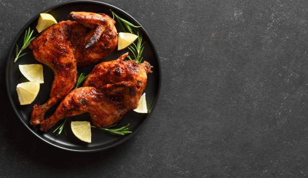 istock Grilled half chicken with lemon and rosemary 2192225505