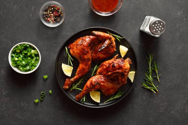 istock Grilled half chicken with lemon and rosemary 2192225506