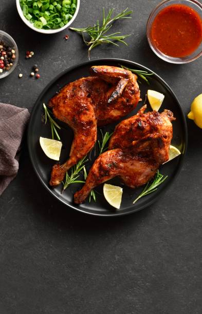 istock Grilled half chicken with lemon and rosemary 2192225518