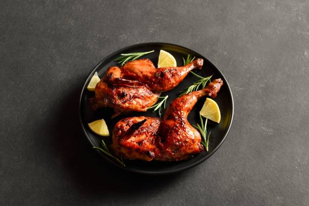 istock Grilled half chicken with lemon and rosemary 2192225520