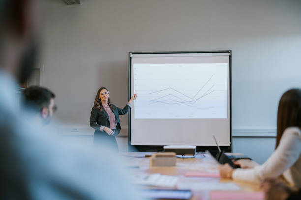 istock Business professional presenting data analysis during a corporate meeting discussion 2192225696