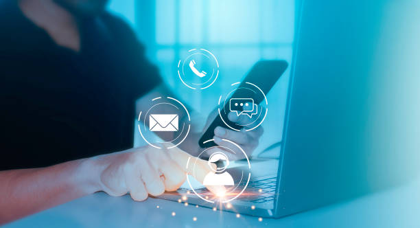 istock Customer support hotline people connect. Man using a smartphone with contact icon. Contact us concept. 2192228315