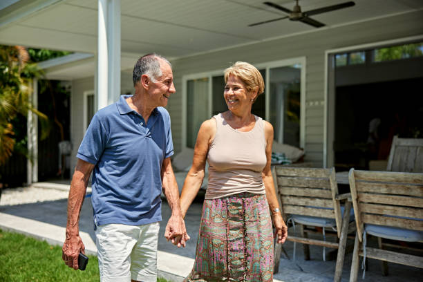 istock Retired couple enjoying backyard sunshine and leisure 2192229216