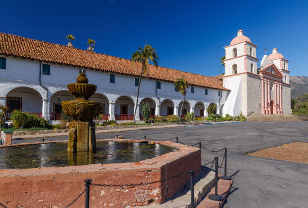 The historic Santa Barbara Mission, known as the Queen of the Missions stands majestically with its Spanish colonial architecture, twin bell towers, and beautiful rose garden