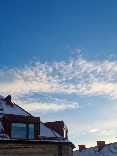 Blue sky in morning over roof tops