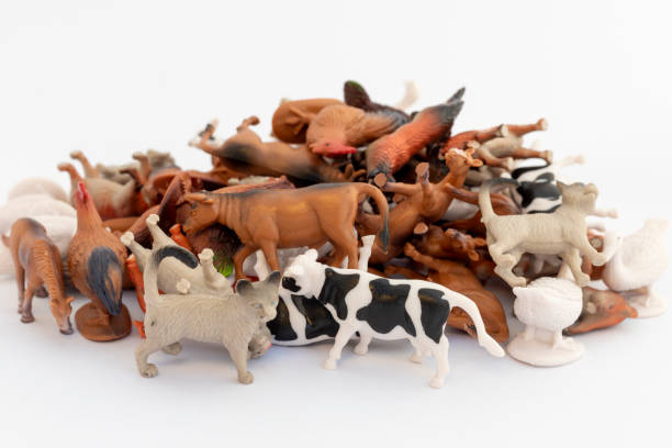 istock Miniature toy mixed animals on white background 2192231141