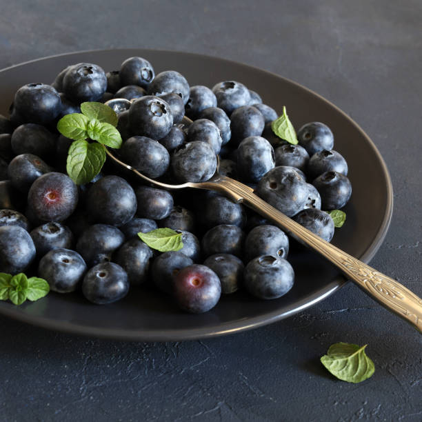 istock Group of fresh organic blueberries. 2192233308