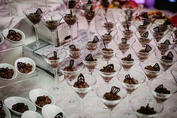 istock Elegant dessert display with chocolate mousse in martini glasses at a catering event. 2192233309