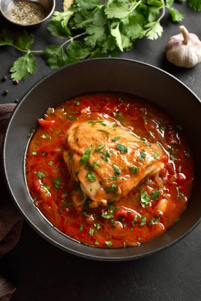 istock Baked chicken with tomato gravy and herbs 2192233571