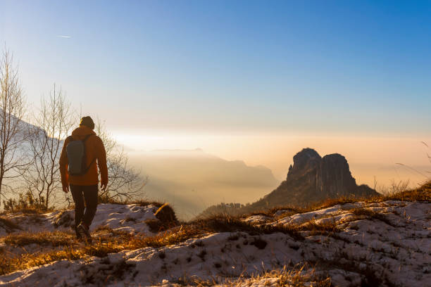 istock Hiker Exploring the Horizon in Peaceful Winter Landscape 2192236766