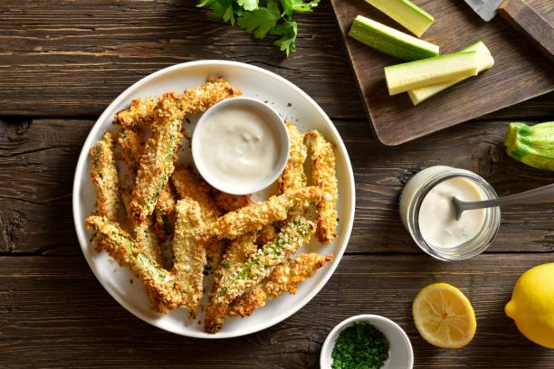 istock Crunchy zucchini breaded sticks with dip sauce 2192237649