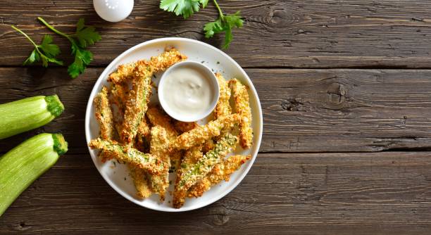 istock Crunchy zucchini breaded sticks with dipping sauce 2192237843