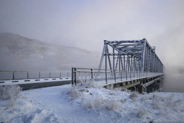 bridge over a river in the winter