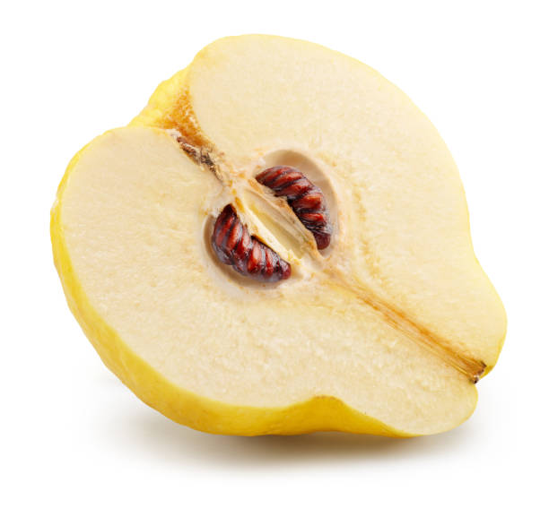 istock Longitudinal section of quince fruit with brown seeds isolated on white background. File contains clipping path. 2192241354