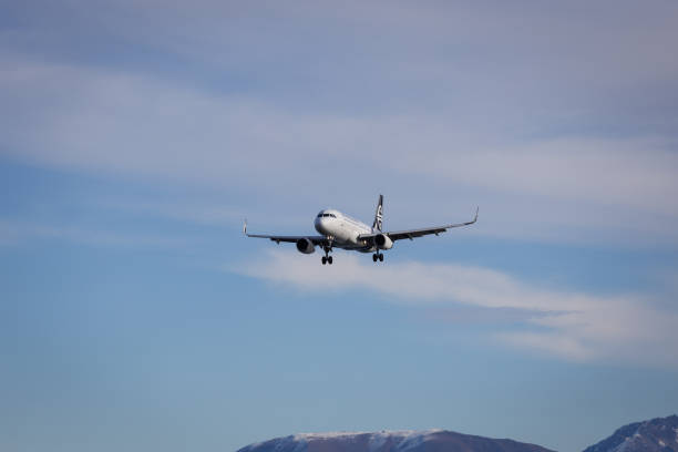 A commercial aeroplane being towed after landing