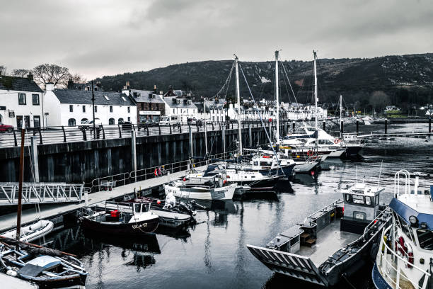 Scenes of Ullapool village on the shores of Loch Broom in the North West Highlands of Scotland. Cold and wet weather on a New Years Eve.