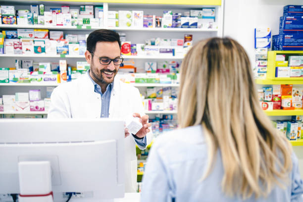 istock Woman buying drugs 2192246860