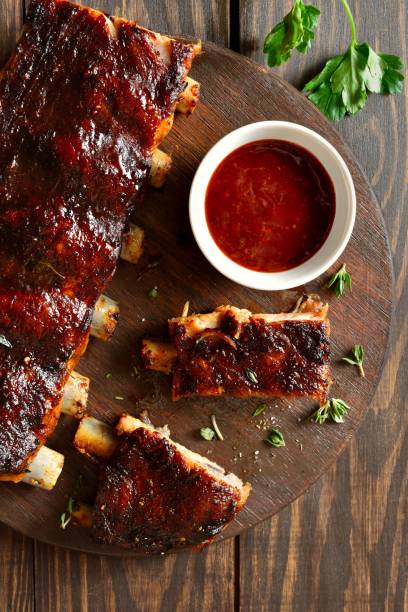 istock Barbecue pork ribs on cutting board 2192247480