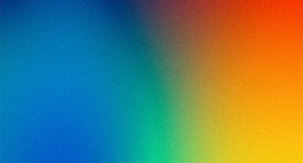 istock Colorful grainy gradient blue green orange blurry  rgb rainbow colors abstract background with noise texture 2192250130