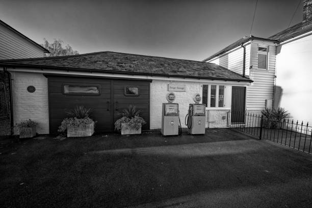 Antique truck in an old garage with the hood open