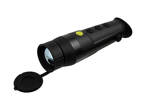 istock Thermal imaging monocular with lens cap, black body, multiple control buttons, and ergonomic design, ideal for night vision and outdoor activities. Isolate on white background. 2192251478
