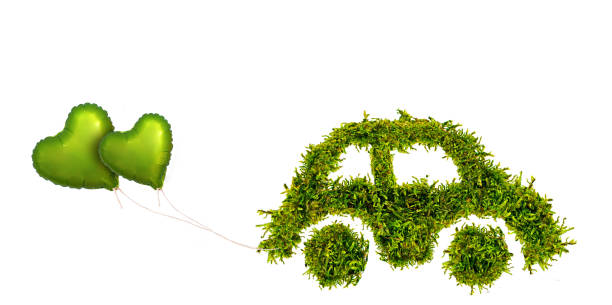 istock green heart shaped balloons on an eco friendly car development, clear ecology driving, no pollution and emmission transportation concept, moss car 2192251916