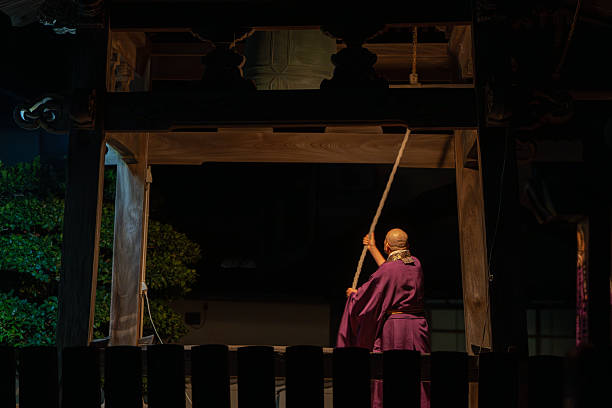 istock A monk ringing a bell to celebrate the new year 2192251987