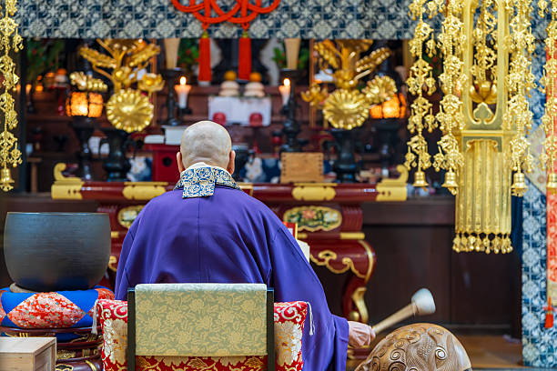istock Image material of a monk praying at a Buddhist altar 2192251998