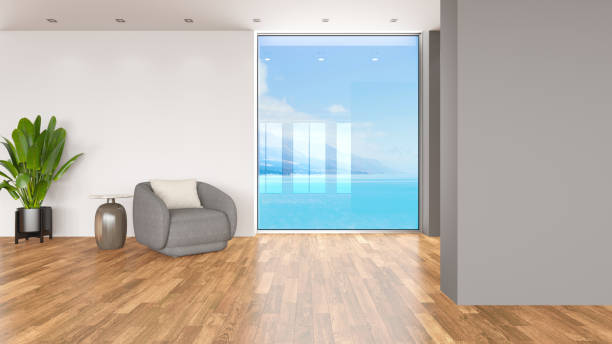 istock Modern Interior with an Armchair and Empty Gray Wall 2192253616