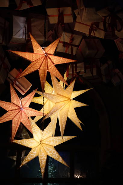 istock Festive decor in the form of several seven-pointed stars with illumination 2192254685