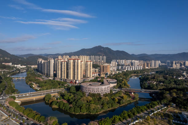 istock Park greening and urban housing by the river 2192255268