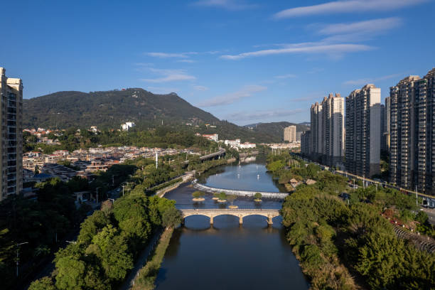 istock Park greening and urban housing by the river 2192255272