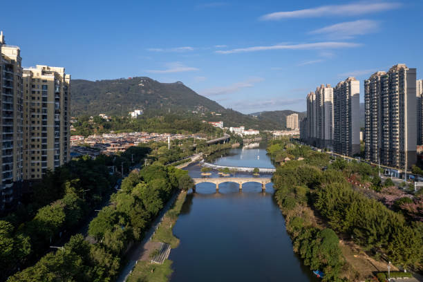 istock Park greening and urban housing by the river 2192255290