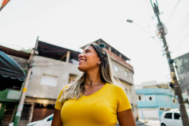 istock Young woman walking looking around in Brazil 2192258961