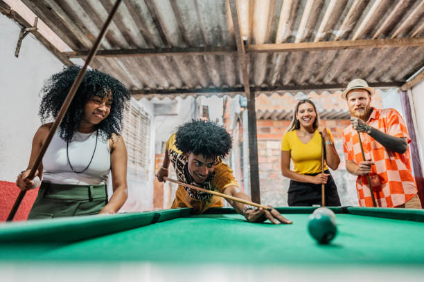 istock Friends playing in snooker bar in favela, Brazil 2192259218