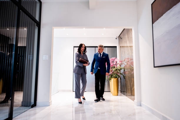 istock Coworkers talking and walking on the office 2192259386