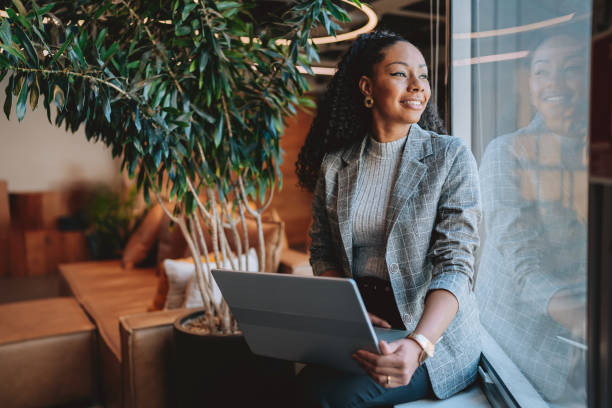 Business woman using laptop