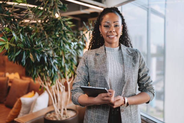 istock Business woman holding digital tablet 2192261151