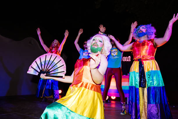 Drag Queens Perform in Vibrant Pride-Themed Costumes at a Lively Event Celebrating Diversity