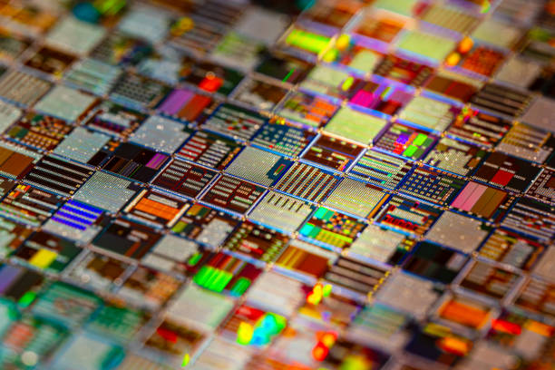 istock Silicon semiconductor wafer close-up. In electronics, a wafer also called a slice or substrate is a thin slice of semiconductor, a crystalline silicon, used for the fabrication of integrated circuits 2192261622