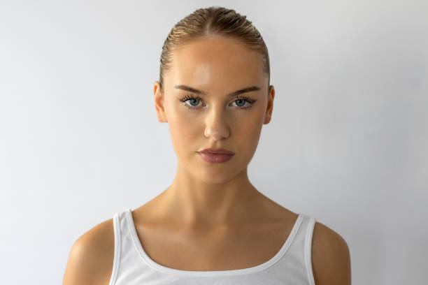 istock Beautiful woman looking directly at camera 2192263197